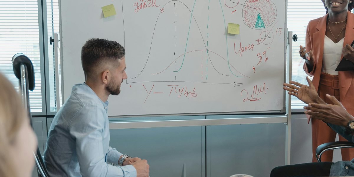 A team actively engaged in a strategy discussion, symbolizing the urgent need for clarity in AI policy development.