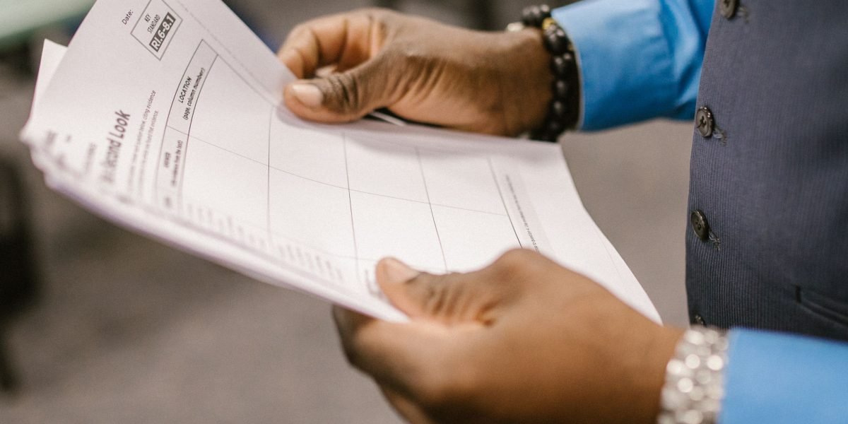 A professional carefully evaluating different options or proposals.