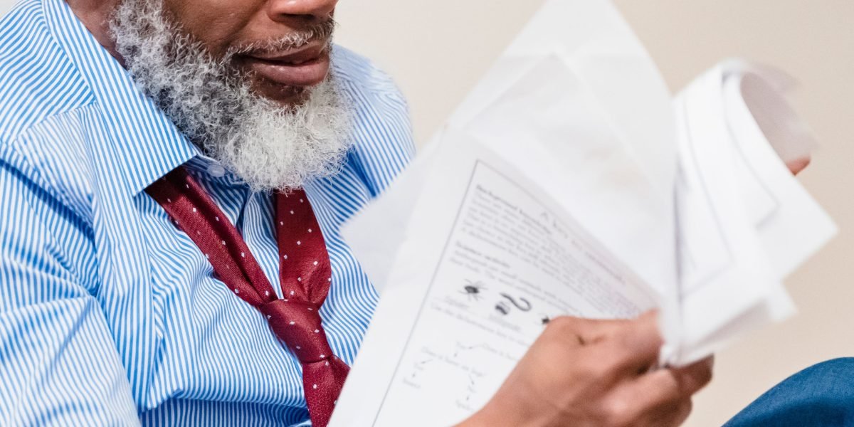 A person engrossed in reading, symbolizing the continuous effort to understand and adapt to the rapid evolution of AI agents.