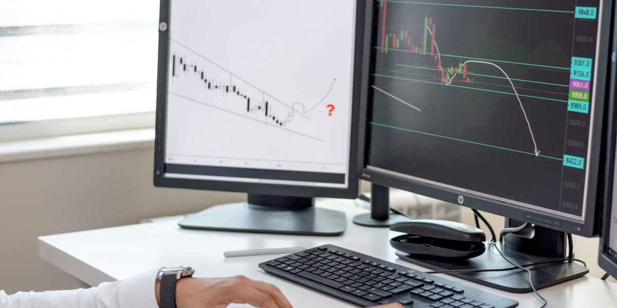 An analyst meticulously reviews diverse data formats, connecting insights for a comprehensive understanding.