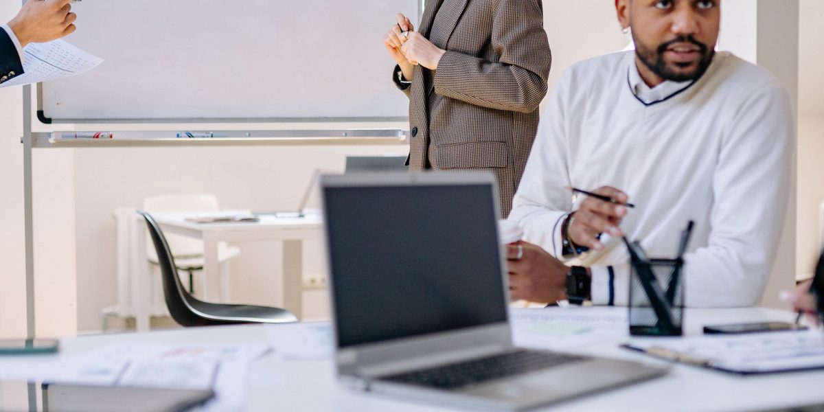 An executive thoughtfully plans strategy, synthesizing information to make critical decisions in a complex AI landscape.