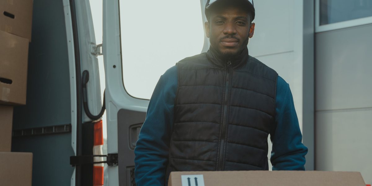 A logistics professional oversees optimized delivery routes, leveraging AI for efficiency.