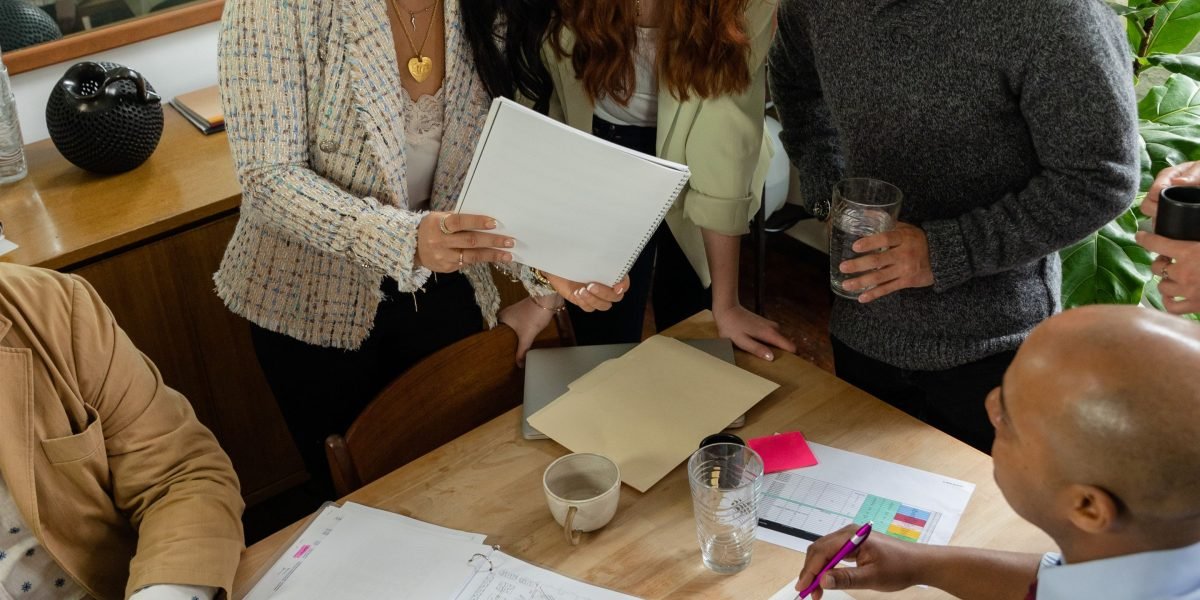 Professionals collaborate to understand and navigate complex business concepts like shell companies.