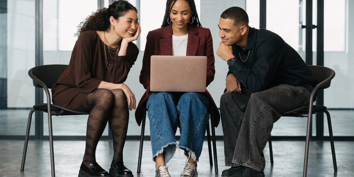 A diverse team actively collaborating in a modern office, symbolizing startup growth and development.