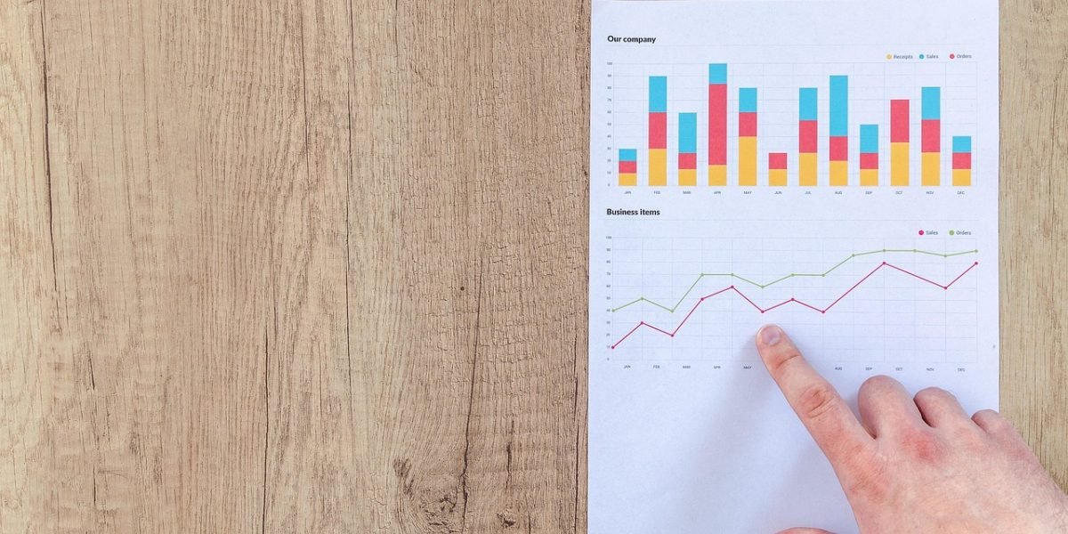 A professional intently analyzing complex data or reports, reflecting the detailed review process in AI testing and red-teaming.