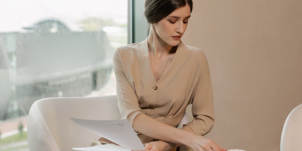 A person reviews information, contemplating business growth and market insights.