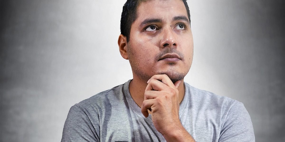 A person in a thoughtful moment, envisioning a new business venture.