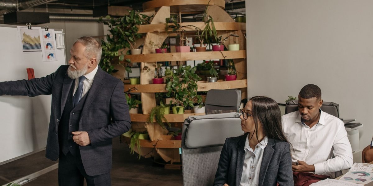 A diverse team utilizes strategic frameworks to plan for AI's cultural impact, ensuring thoughtful implementation and policy development.