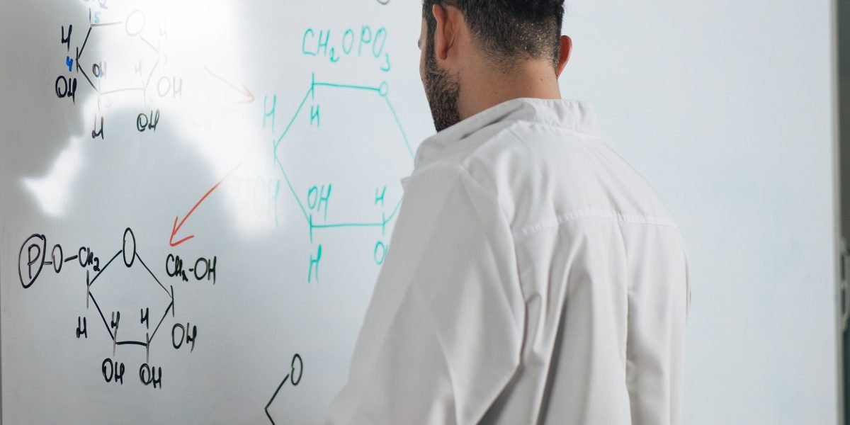 Researchers collaborating, illustrating the balance between open science and security rules in higher education.
